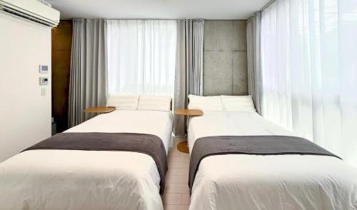 Higashinippori Apartment | 101Room,7-minute walk from Uguisudani Station located on the 1nd floor of an apartment-style building Twin room No elevator