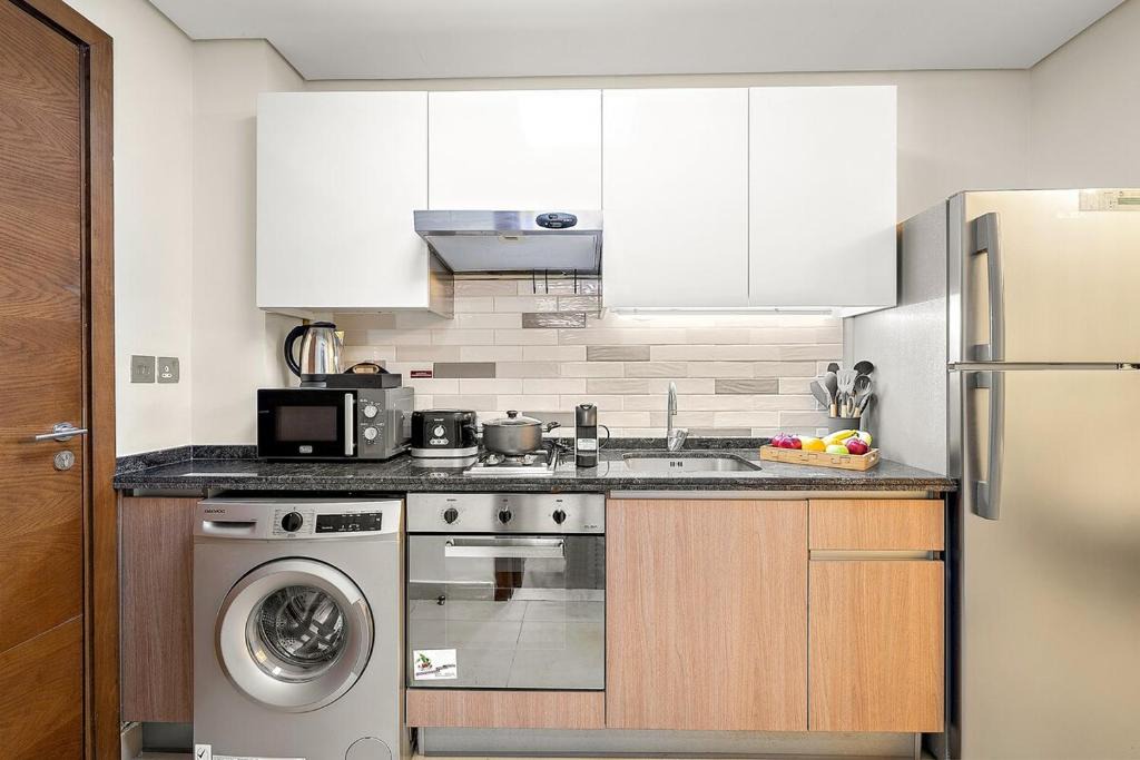 Discovery Gardens Apartment | FIRST CLASS Studio Classy Comfort