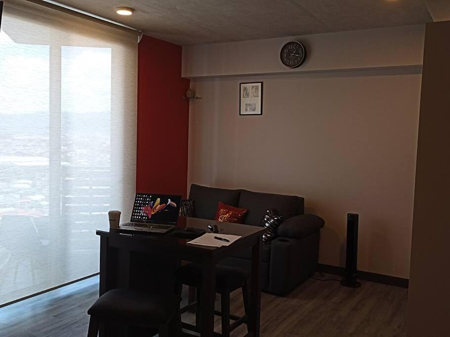 Mata Redonda Apartment | Prime city loft with skyline views and a dedicated workspace