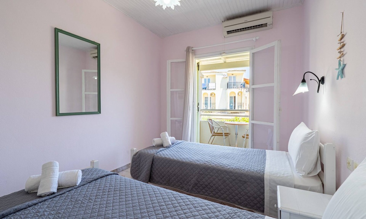 Roda Apartment | Studio 'Alexandros Studios 3' with Shared Pool, Wi-Fi and Air Conditioning