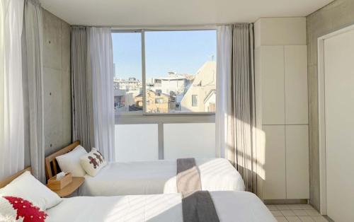 Higashinippori Apartment | 401Room,7-minute walk from Uguisudani Station located on the 4nd floor of an apartment-style building Twin room No elevator