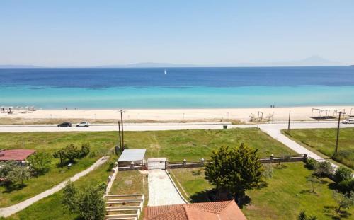 Ormos Panagias Villa | Absolute Beachfront Villa-Grand Sandy Beach