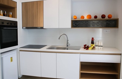 Olympiada Apartment | Aristotelia Gi Studio - Cozy Poolside Bliss