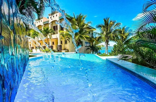 Playa Flamingo Condo | Beautiful Condo in Peaceful Cliffside Location with a Private Balcony & Stunning Ocean and Mountain Views