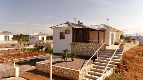 Messini House | Boho Natural Beachfront Detached House