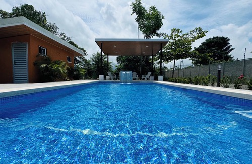 Parrita House | Family-Friendly 4BR Oasis with A/C & Pool near Playa Bandera