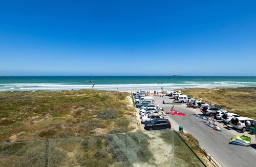 Sunset Beach House | Ocean 9 - Beachfront Lodge