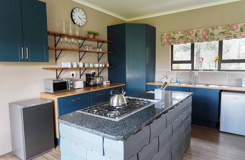 Kwa Sani House | Off-grid mountain cottage with mountain views on a peaceful smallholding