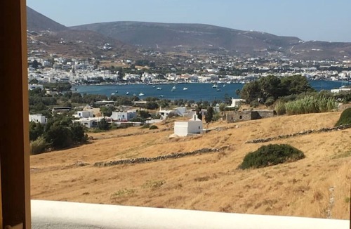 Krotiri Apartment | Penthouse studio overlooking Paroikia Bay!