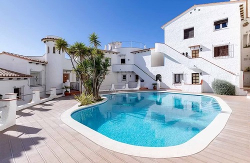 Sitges Apartment | Sitges. Mediterranean Balcony. Amazing views. Beach and pool. A/C. Parking. WIFI