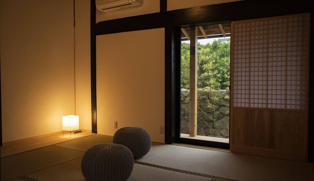 A single old private house for rent, limited to one couple per day, towering along a cove on Fukue Island in the Goto Archipelago.