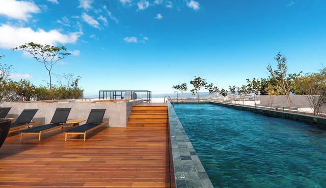 Brand NEW Stylish Apartment with heated pool, fully equipped gym and AC.