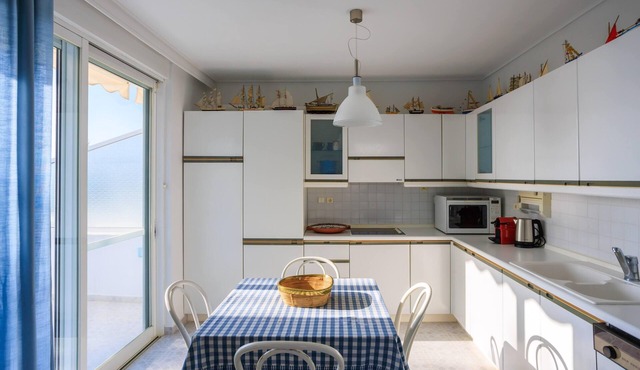 Exquisite Villa in Athens Suburbs, Steps from the Beach, Hosting a Private Pool