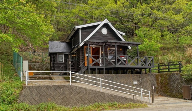 Fashionable charming log house standing /Ito Shizuoka