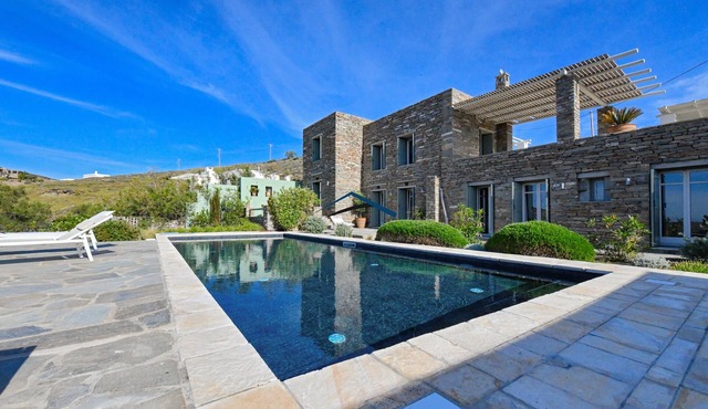 Luxurious villa, with a swimming pool and close to a sandy beach.