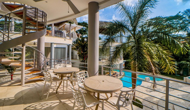 Luxury condo with private rooftop hot tub, W/D, and pool - close to the beach