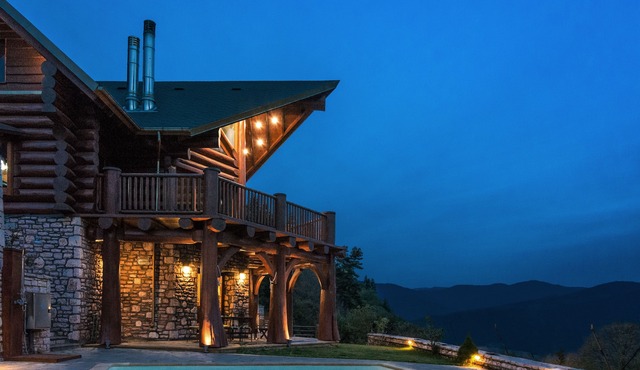 Luxury secluded mountain log chalet with pool (shared)