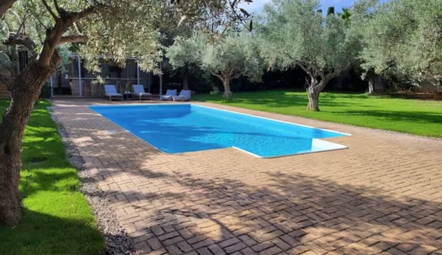 Minimal house with pool and large garden at Varkiza. 5 minutes from the beach!