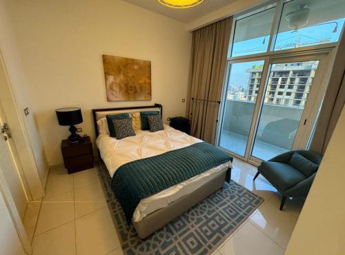 Premium 1BR Apartment In Damac Ghalia with City View & Balcony