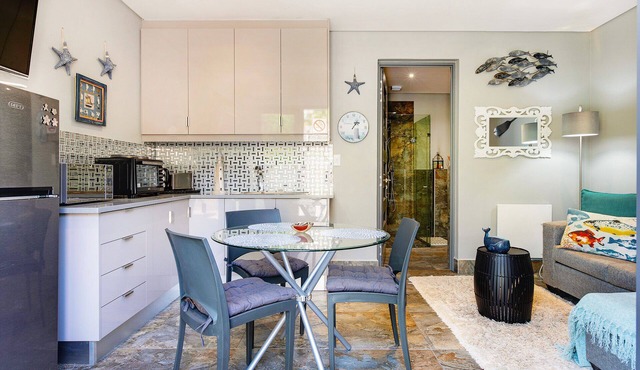 Solar Powered Breathtaking Sea Views of Camps Bay with Private Outdoor Terrace.