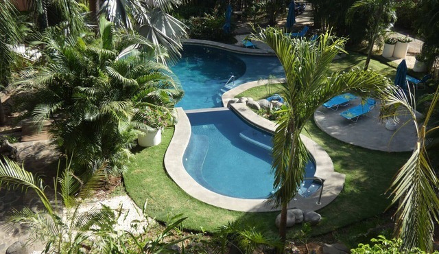 Tropical 2BR 2BA Condo 1 mile from 2 beautiful beaches and town!